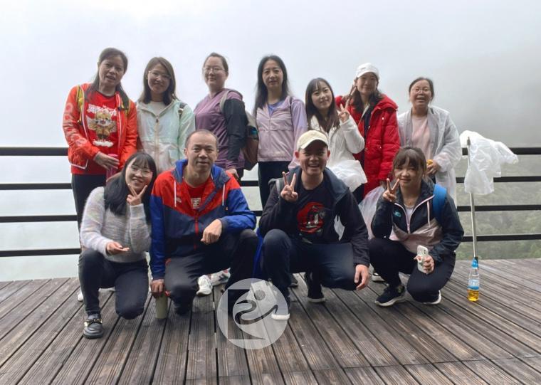 昆明旭坤举行“永攀高峰”登轿子山活动庆祝建所18周年12.jpg